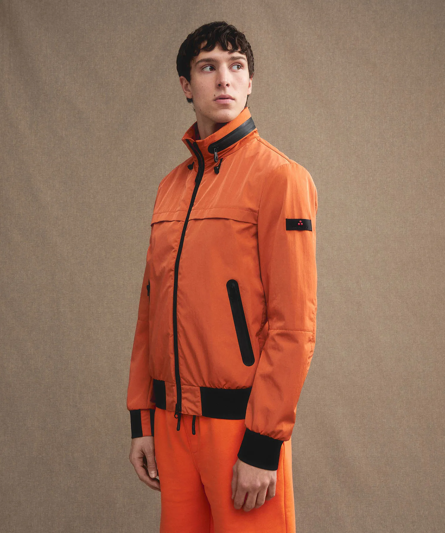 Bomber in nylon con cappuccio estraibile