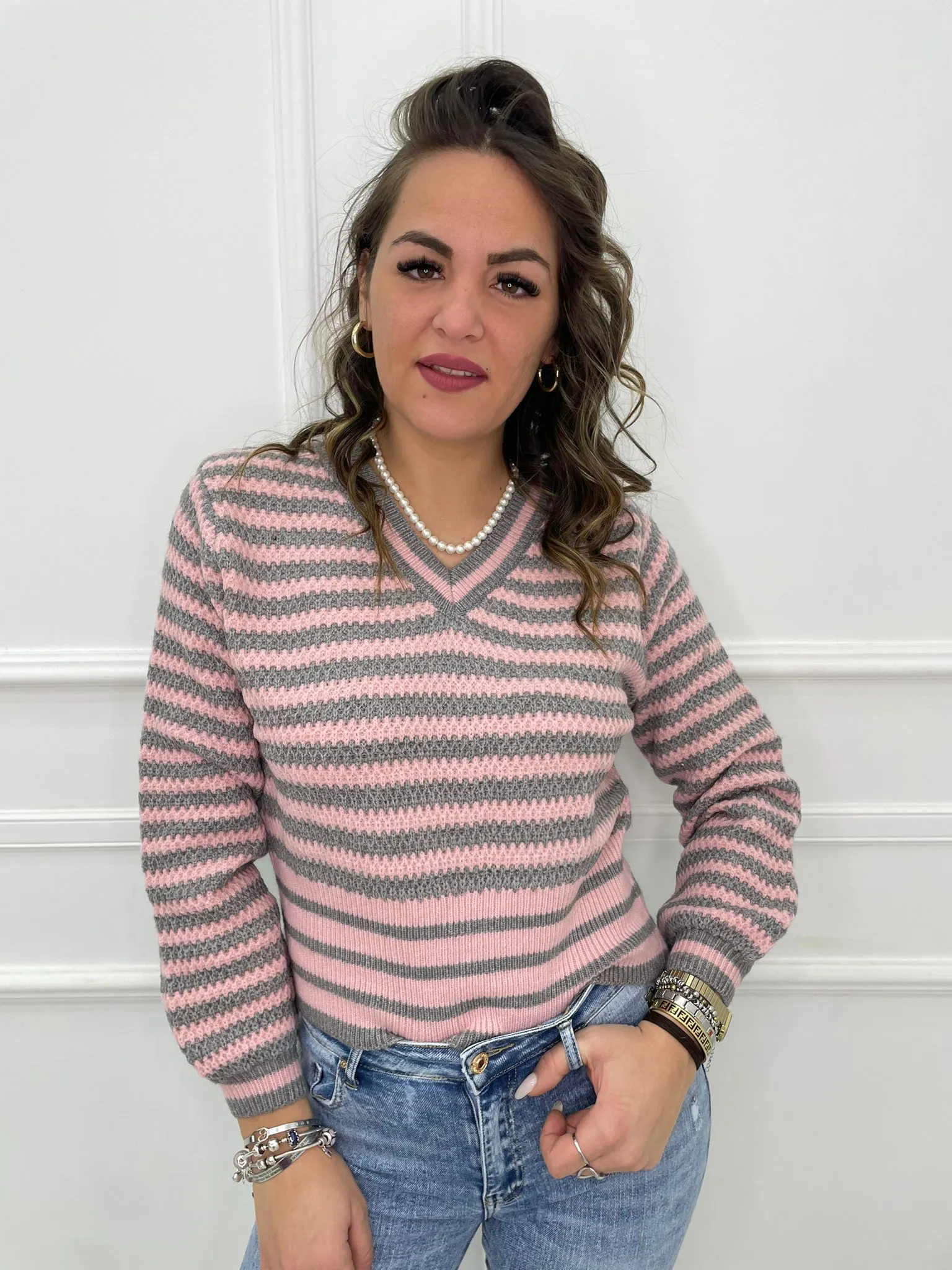 Maglione over scollo a v fantasia righe