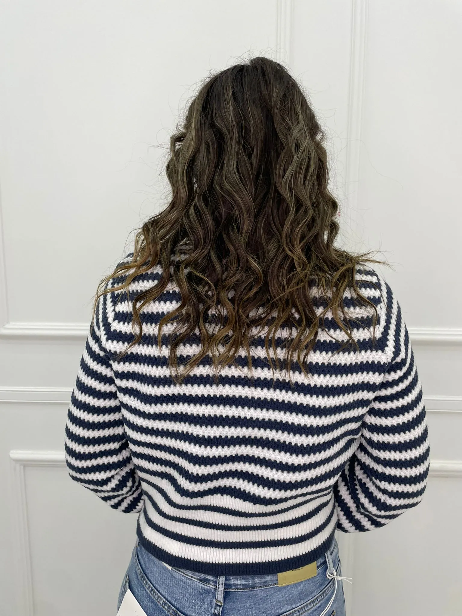 Maglione over scollo a v fantasia righe