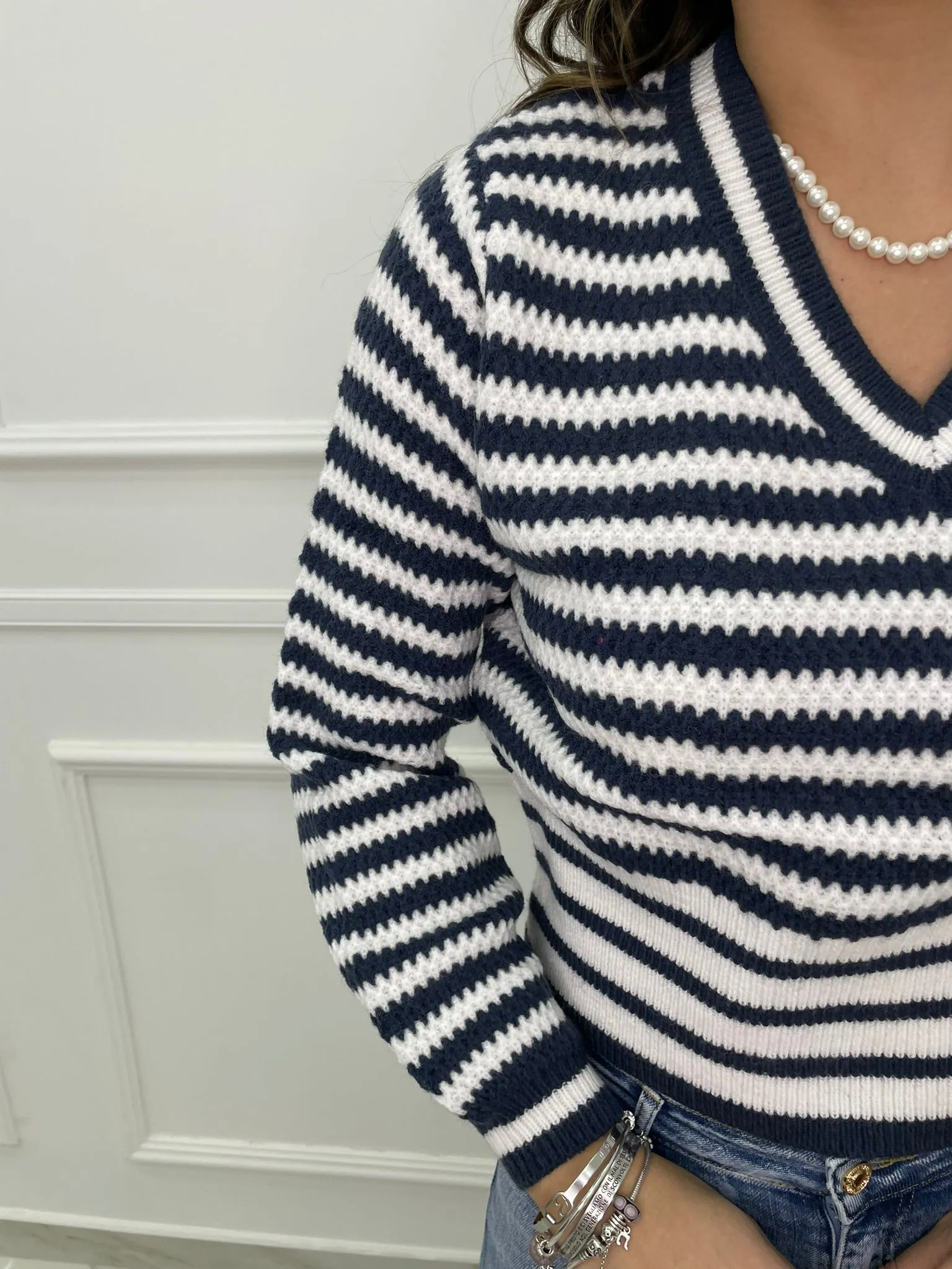 Maglione over scollo a v fantasia righe