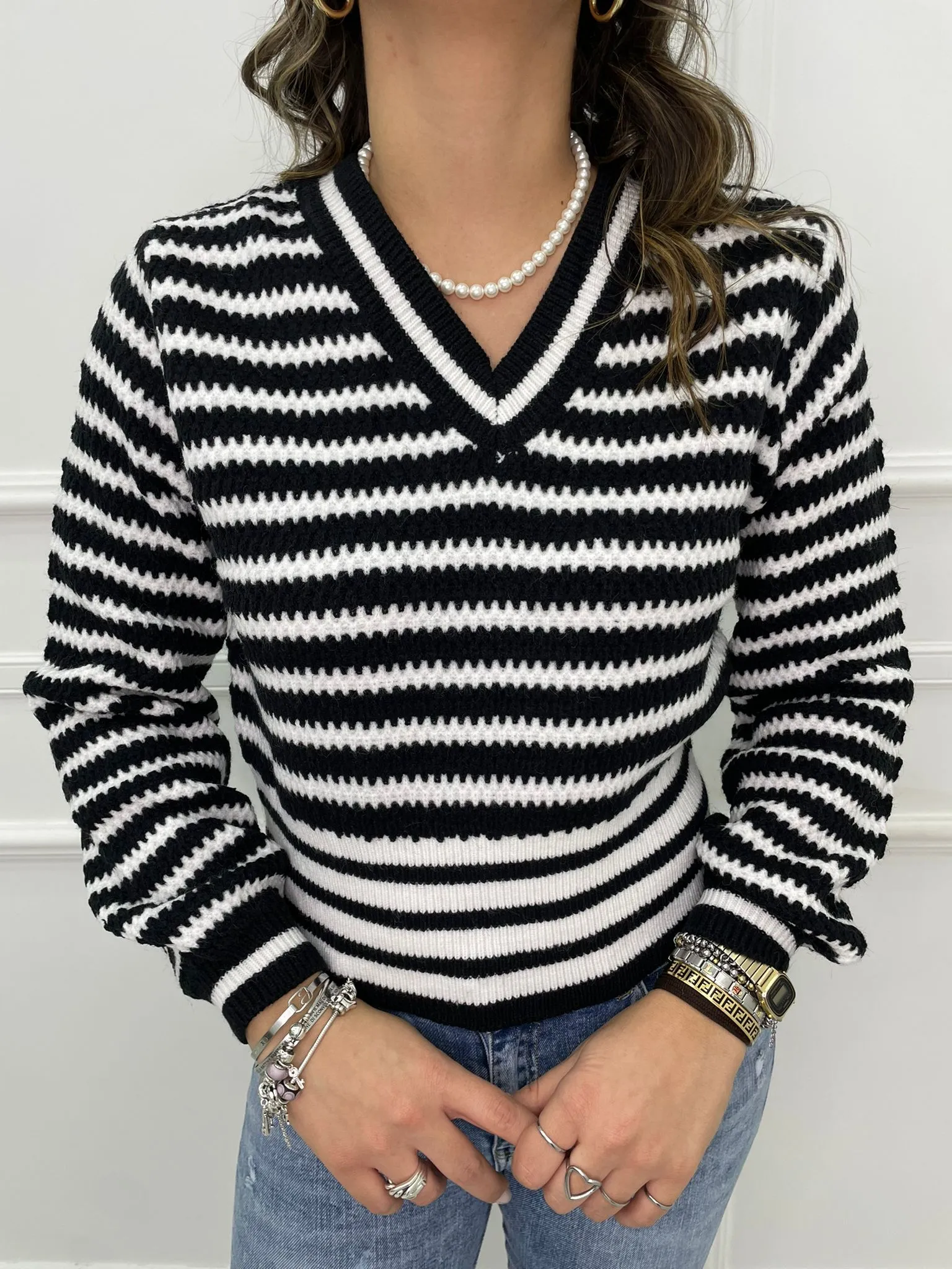 Maglione over scollo a v fantasia righe