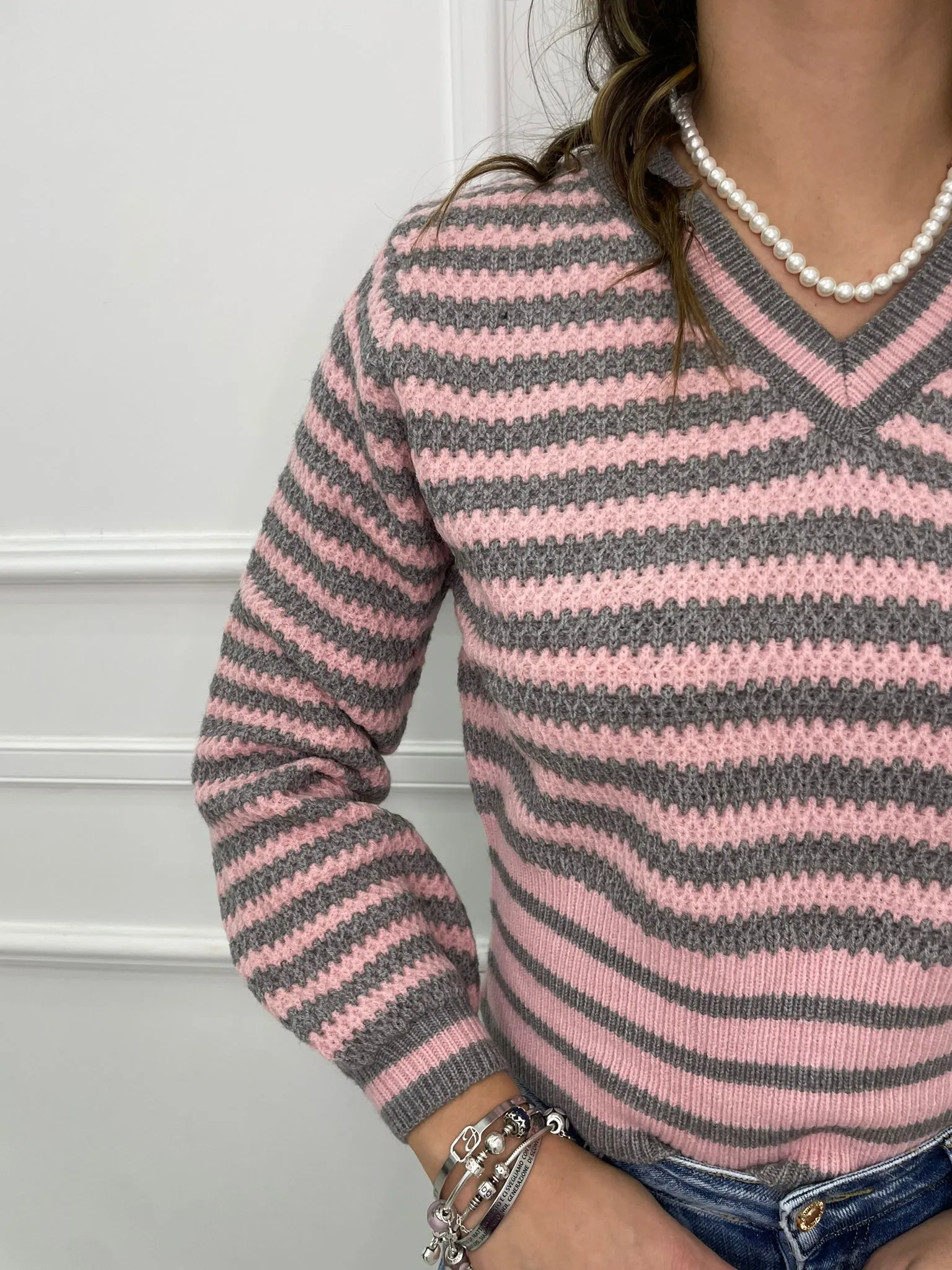 Maglione over scollo a v fantasia righe