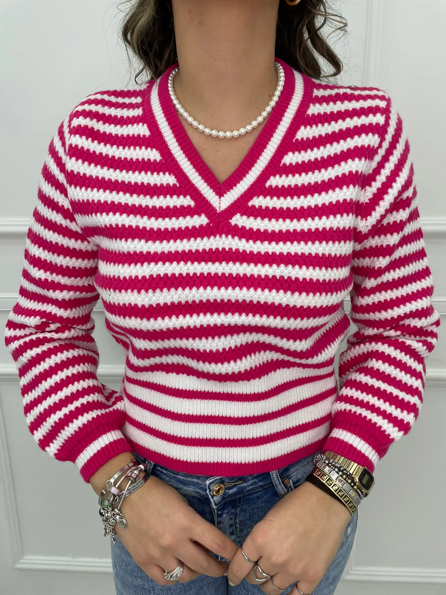 Maglione over scollo a v fantasia righe